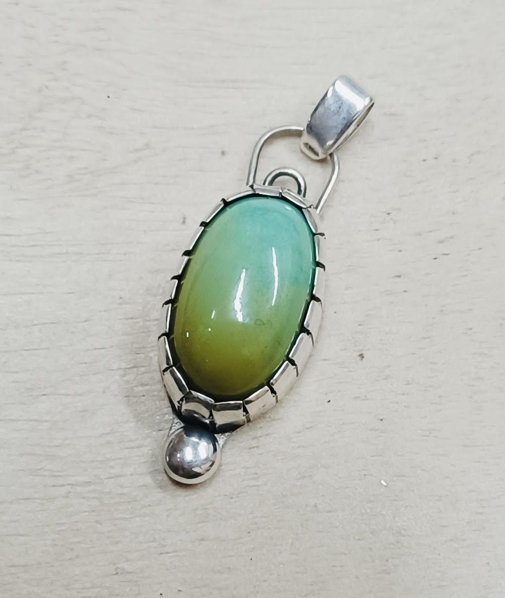  This beautiful piece was created by Songfeather Angie Young. 